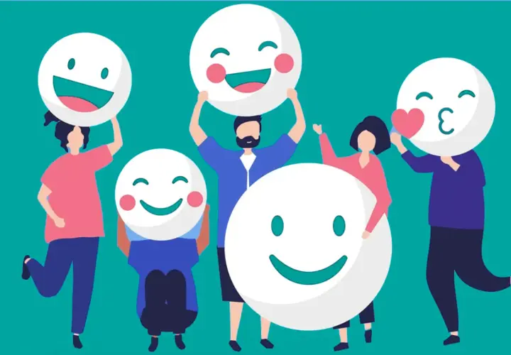Personas celebrando la inteligencia emocional en el aula, mostrando diferentes caritas felices.