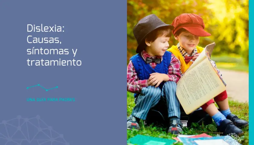 Dos niños leyendo un libro, uno con sombrero negro y otro con gorra roja. Una guía para padres sobre dislexia.
